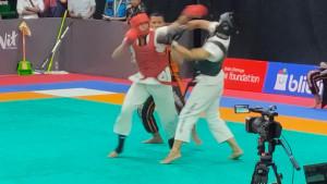 20251015_Atlet-kodrat-Jateng-Hizkhiel-Pasaji-Nasucha-saat-bertarung_1.jpg