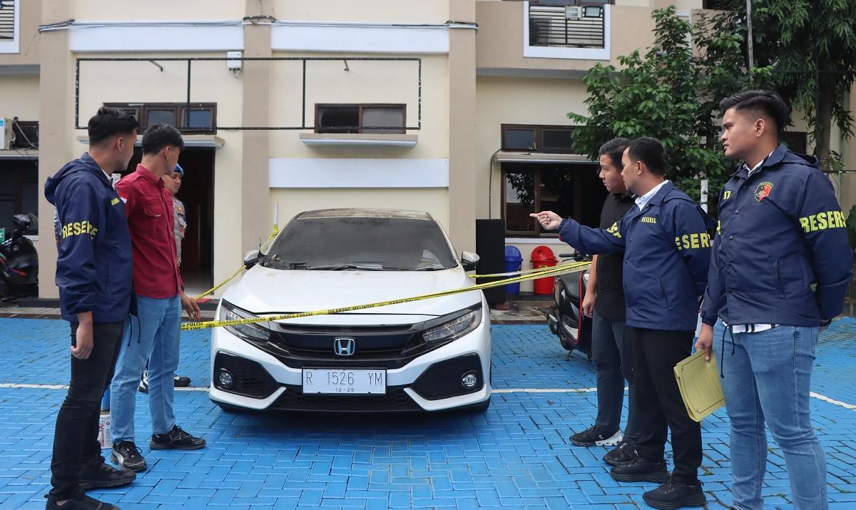 20260519_barang-bukti-kasus-pembakaran-mobil-Honda-Civic-Turbo-milik-Kades-Hoho_1.jpg