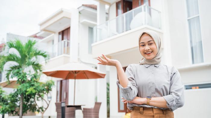 ilustrasi-wanita-hijab-rumah-KPR-BRI.jpg