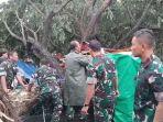 Anggota-Kodim-0727-Karanganyar-berupaya-membantu-mengevakuasi-korban.jpg