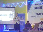 Anggota-Komisi-IX-DPR-RI-Nafa-Indria-Urbachsaat-memberikan-sosialisasi-soal-MBG.jpg