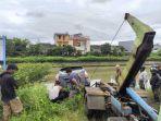 Avanza-tercebur-di-kanal-Jalan-Tamangapa-Raya.jpg