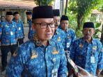 Bupati-Kudus-HM-Hartopo-saat-diwawancarai-awak-media.jpg