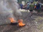 DEMO-Ratusan-masyarakat-sedang-melakukan-aksi-demonstrasi.jpg