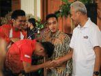 Ganjar-Pranowo-didampingi-Walikota-Solo-Gibran-Rakabuming-Raka-membuka-Pekan-Paralympic.jpg