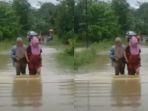 Ibu-Hamil-Terobos-Banjir-Sukabumi.jpg