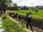 Kegiatan-Karya-Bakti-TNI-Kodim-0718Pati-bersihkan-Kali-Simo.jpg