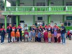 Klub-sepeda-motor-2-Tak-Jepara-menyerahkan-bantuan-uang.jpg
