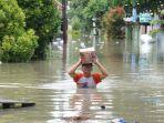 Kondisi-banjir-melumpuhkan-aktivitas-warga-di-Kecamatan-Mojolaban.jpg