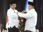 Mahfud-MD-dari-Ketua-Dewan-Penasihat-PC-GP-Ansor-Demak-Nurul-Muttaqin.jpg