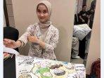 Nadya-sedang-merekam-diskusi-dalam-bentuk-gambar-Graphic-Recording.jpg