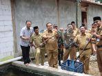 PANEN-LELE-Bupati-Blora-Arief-Rohman-saat-panen-lele-di-Desa-Pan.jpg
