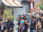 Pelaku-berinisial-H-saat-diamankan-polisi-tribun-timur.jpg