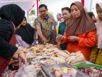 Pj-Gubernur-Jatengg-Nana-Sudjana-saat-mengikuti-kegiatan.jpg