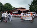 Ratusan-warga-Kudus-menggelar-kirab-budaya-jalan-kaki-dari-Alun-alun-menutup-Dandangan.jpg
