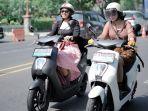 Sejumlah-biker-wanita-saat-menggelar-city-touring-menggunakan-Honda-EM1-e-beberapa-waktu-lalu.jpg