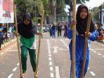 Sejumlah-pelajar-saat-mengikuti-lomba-egrangg.jpg