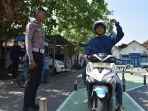 Suasana-jalur-ujian-praktek-SIM-C-di-Kantor-Pembuatan-SIM-Polres-Demak.jpg