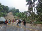 Suasana-lokasi-longsor-yang-menyebabkan-satu-bus-masuk-ke-jurang-di-Desa-Sibolangit.jpg