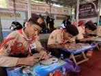 Suasana-lomba-mewarnai-wayang-yang-digelar-saat-Hari-Wayang-Nasional.jpg