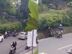 Tangkapan-layar-video-aksi-seorang-petugas-patwal-diduga-tendang-pengendara-motor.jpg