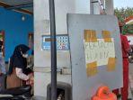 Tulisan-berbunyi-Pertalite-Habis-terpampang-di-dekat-mesin-pengisian-bahan-bakar.jpg