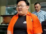 Yudo-Andreawan-saat-digelandang-penyidik-Polda-Metro-Jaya.jpg