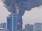 gedung-pencakar-langitGreater-Nile-Petroleum-Oil-Company-Towerterbakar.jpg