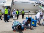 jamaah-haji-kloter-1-tiba-di-bandara-adi-soemarmo-boyolali-selasa-2882018_20180828_161114.jpg