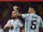 leandro-paredes-kanan-dan-lionel-messi-kiri-saat-merayakan-gol-untuk-timnas-argentina.jpg