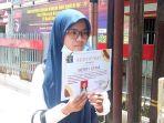 merry-utami-tuntut-keadilan.jpg