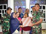 pamit-pulang-membangun-jatimulya-satgas-tmmd-tegal-berikan-cinderamata.jpg