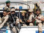 pasukan-houthi-menumpang-di-bak-truk-polisi-di-sanaa-yaman-19-februari-2020.jpg