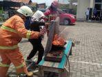 pemadaman-api-cara-konvensional-di-pekalongan.jpg