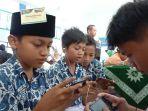 peserta-lomba-esport-mobile-legends-saat-bertanding-dalam-kompetisi-coding.jpg