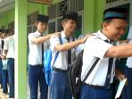 pijat-pijatan-sebelum-ujian-nasional-smp-di-purwokerto.jpg