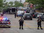polisi-amankan-lokasi-penembakan-massal-di-illinois-chicago-as.jpg
