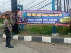 polres-tegal-kota-memasang-spanduk-imbauan-waspada-aksi-kejahatan.jpg