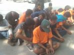 puluhan-orang-diduga-pelaku-penjarahan-di-palu_20181002_203604.jpg