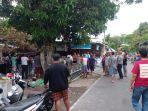 relawan-dan-warga-mengevakuasi-korban-tersengat-listrik-dari-atas-pohon-mangga-di-desa-tohudan.jpg