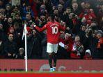 solskjaer-gigit-jari-puji-rashford.jpg