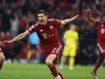 striker-bayern-muenchen-robert-lewandowski-merayakan-gol.jpg