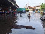 tanggul-pelabuhan-tanjung-emas-semarang-jebol-23-mei-2022.jpg