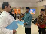 wali-kota-madiun-maidi-menyerahkan-surat-keputusan-pengangkatan-ratusan.jpg