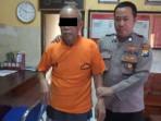 BACOK-TETANGGA-Polisi-mengamankan-Hasyim-Hamid.jpg