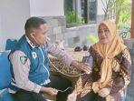 Ketua-KPU-Kota-Pasuruan-Royce-Diana-Sari-memimpi-tes-kesehatan.jpg