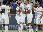 Penyerang-Ittihad-asal-Prancis-Karim-Benzema-tengah-merayakan-dengan-rekan-setimnya.jpg