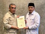 Rusdi-Sutedjo-saat-menerima-rekom-untuk-maju-Pilkada-Pasuruan.jpg