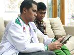 Wakil-Ketua-DPW-PBB-Provinsi-Jawa-Timur-Mathur-Husyairi-jaket-putih.jpg