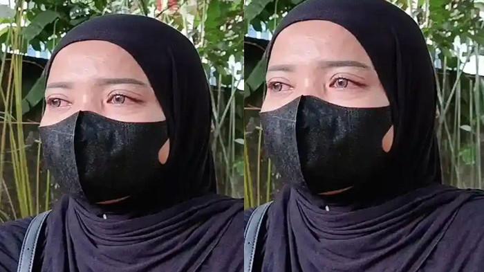 ISTRI KORBAN PEMBUNUHAN - Seorang wanita di Binjai, Sumatera Utara bernama Pipit Widari (31) tak kuasa menahan tangis yang keluar dari matanya. Ia menangis jasad suami, Syahdan Saputra Lubis (35) hingga kini belum ditemukan, Rabu (18/11/2025).
